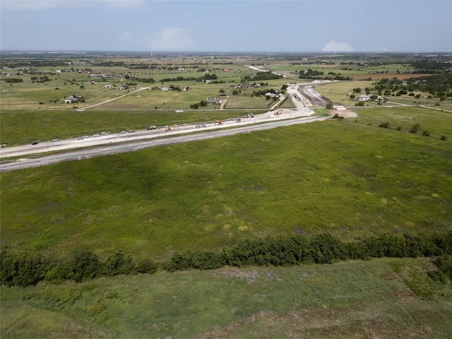 a view of an ocean and city