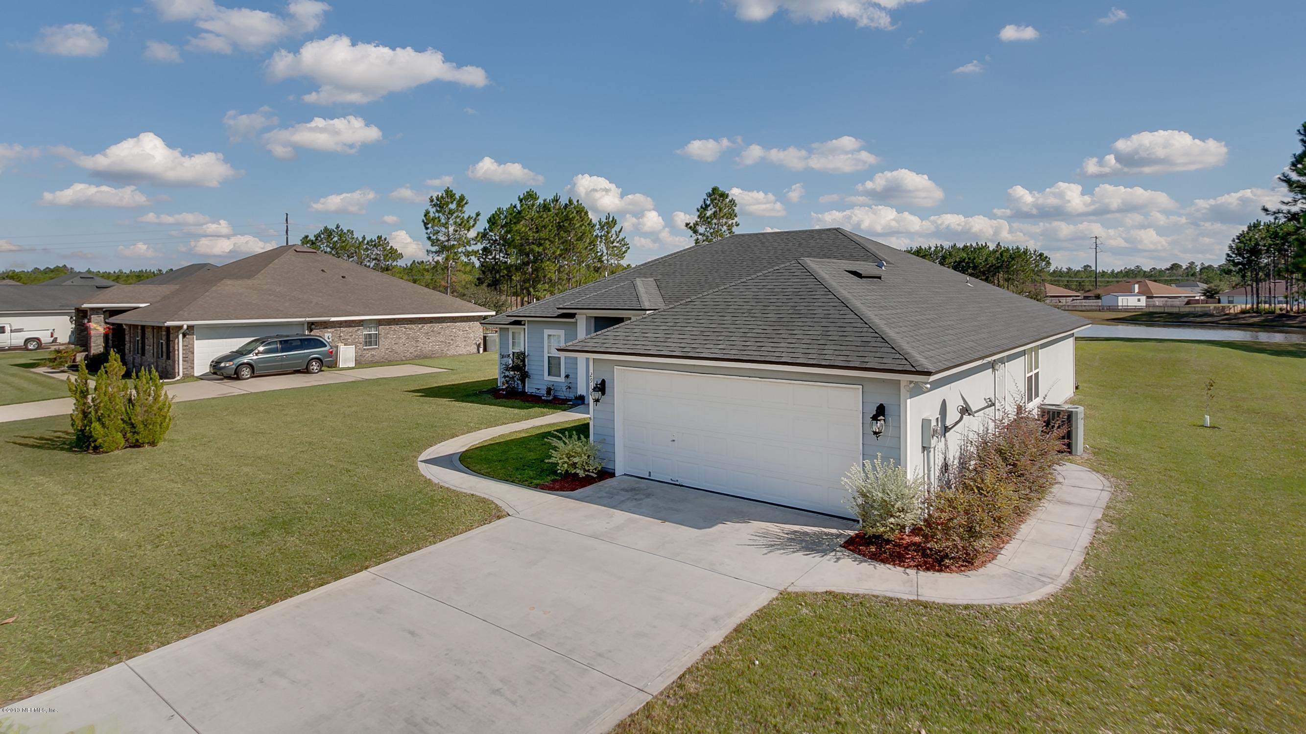 2918 Longleaf Ranch Circle Middleburg, FL 32068 - Photo 22 of 29 Garage_Entry