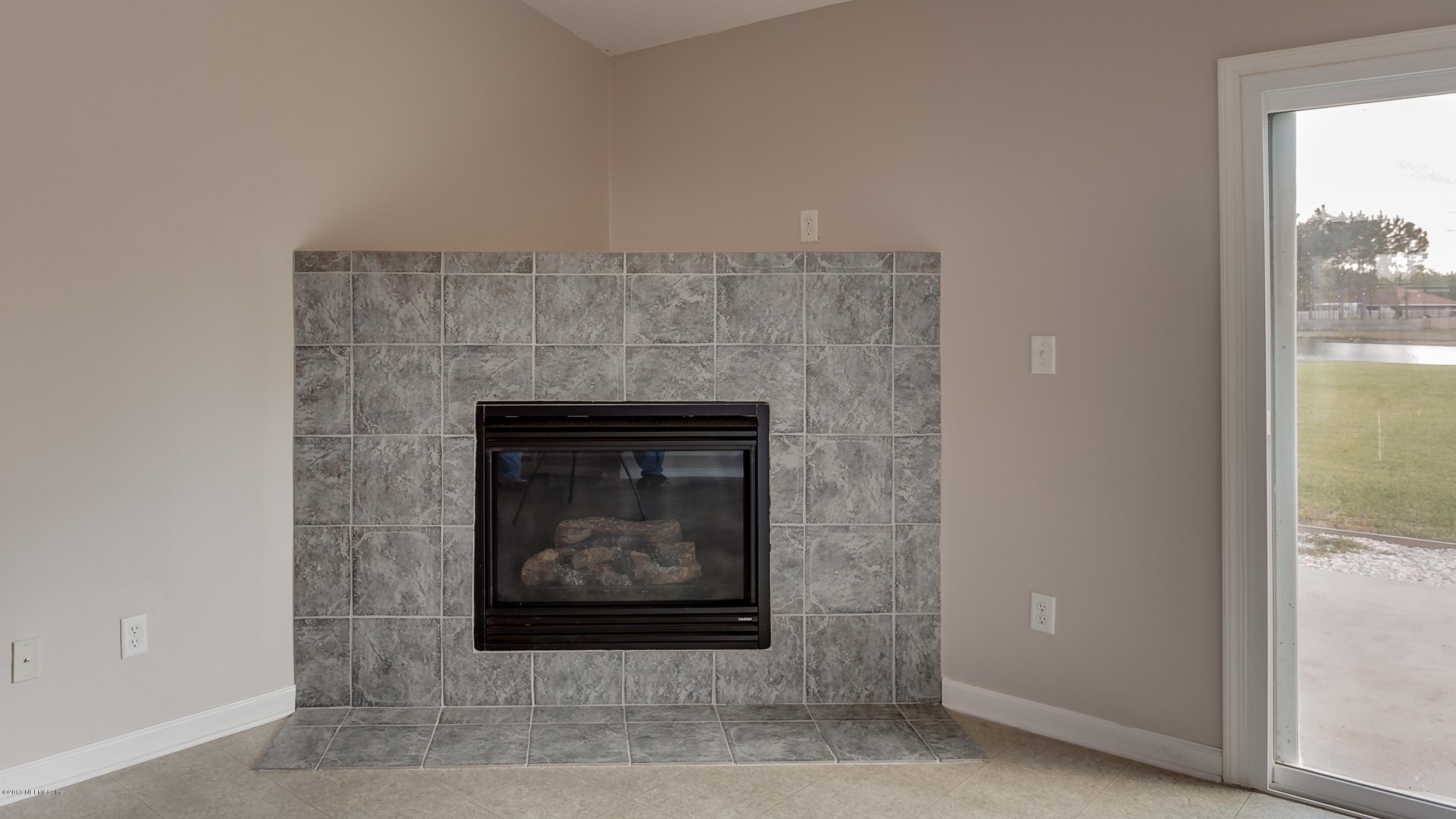 2918 Longleaf Ranch Circle Middleburg, FL 32068 - Photo 6 of 29 Family_Room_Fireplace