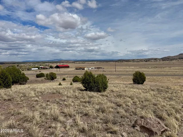 a view of swimming pool with seating