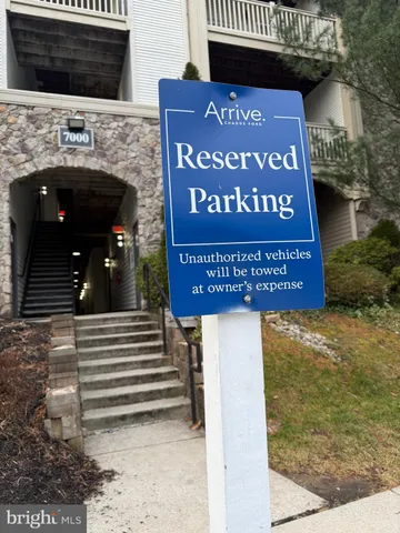 a view of a swimming pool with lounge chairs
