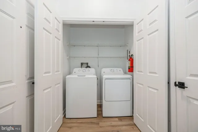 a utility room with dryer and washer