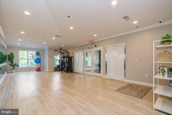 a view of a building stairs and a living room