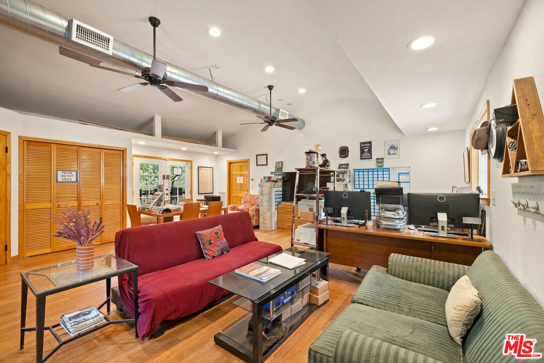 9145 La Tuna Canyon Road Sun Valley, CA 91352 - Photo 12 of 16 a living room with furniture and a flat screen tv