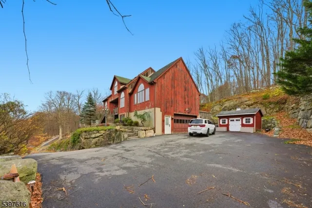 a view of a cars parked in front of a house