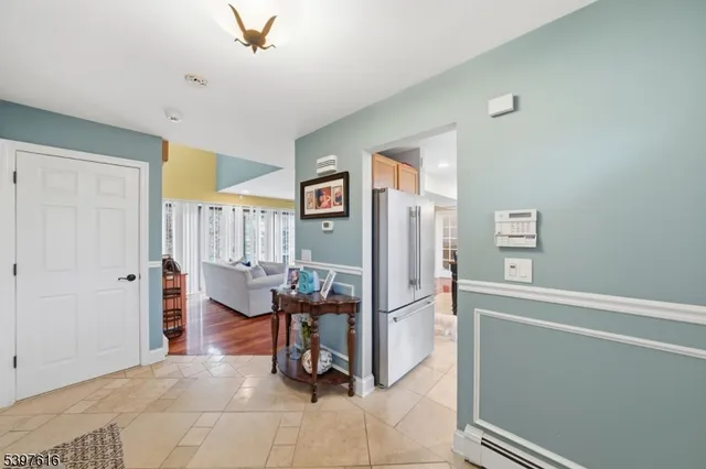 a view of a hallway with seating area
