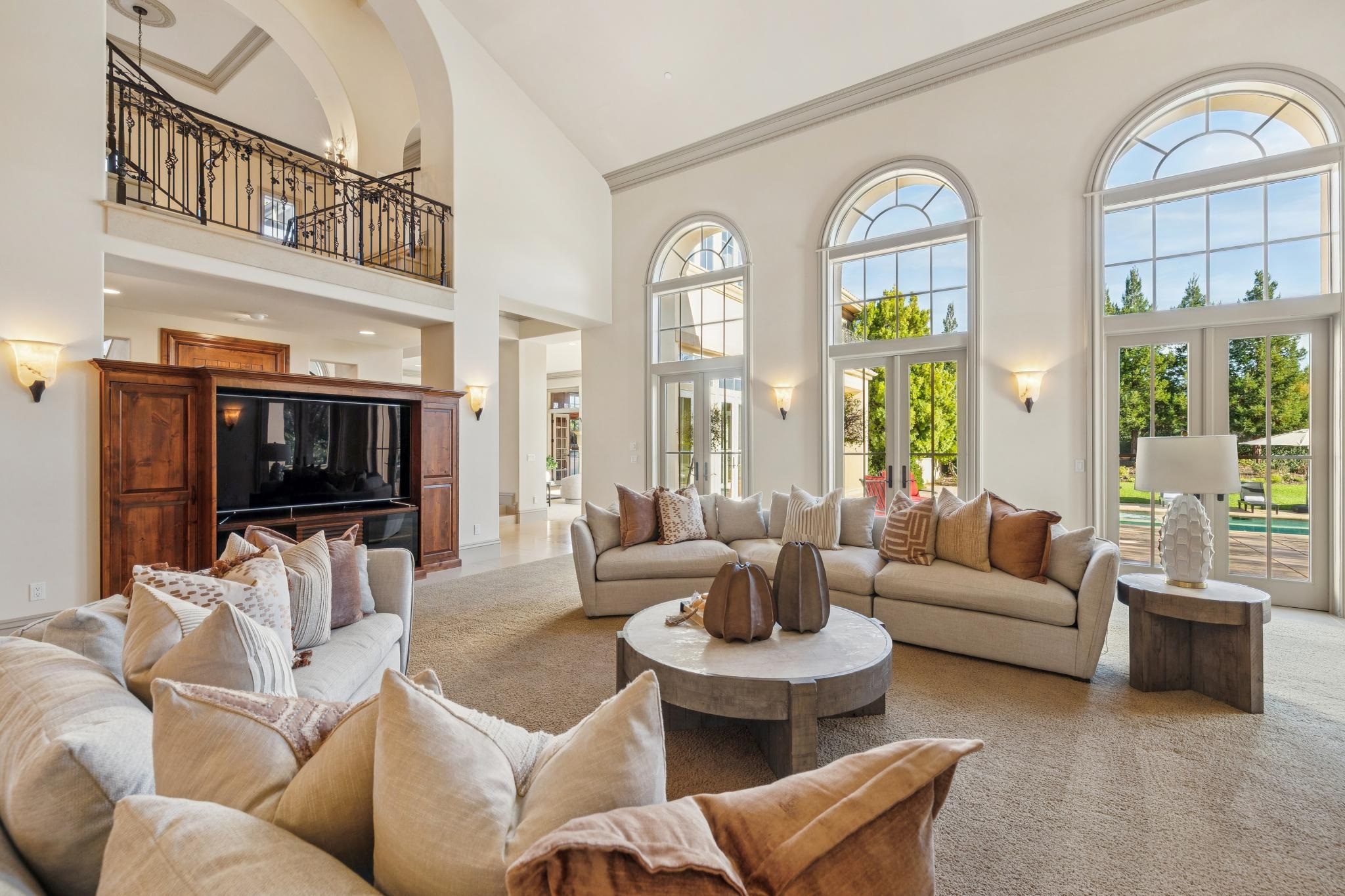 1398 Piemonte Drive Pleasanton, CA 94566 - Photo 26 of 60 a living room with furniture and a flat screen tv