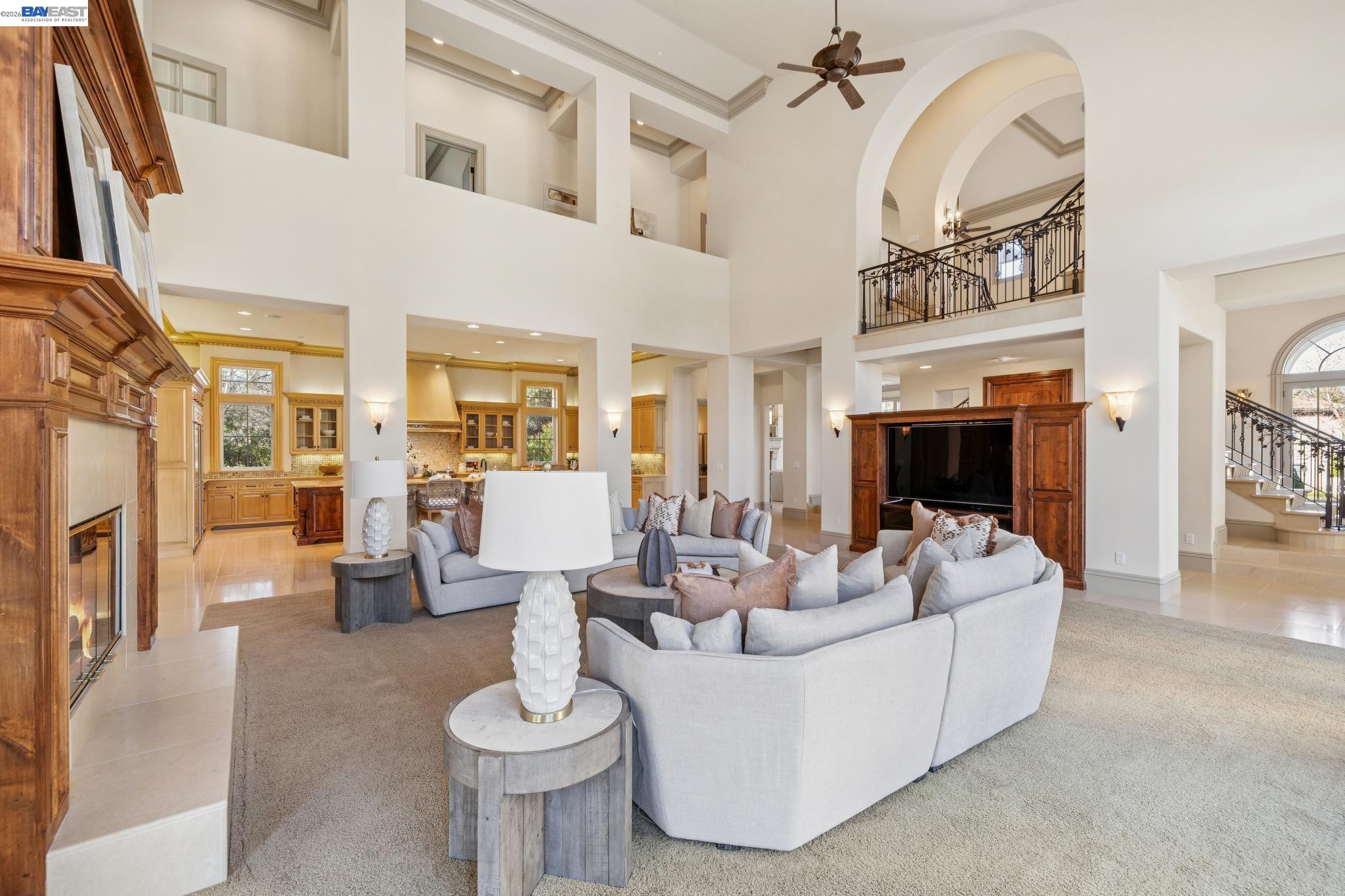1398 Piemonte Drive Pleasanton, CA 94566 - Photo 28 of 60 a living room with fireplace furniture and a large window
