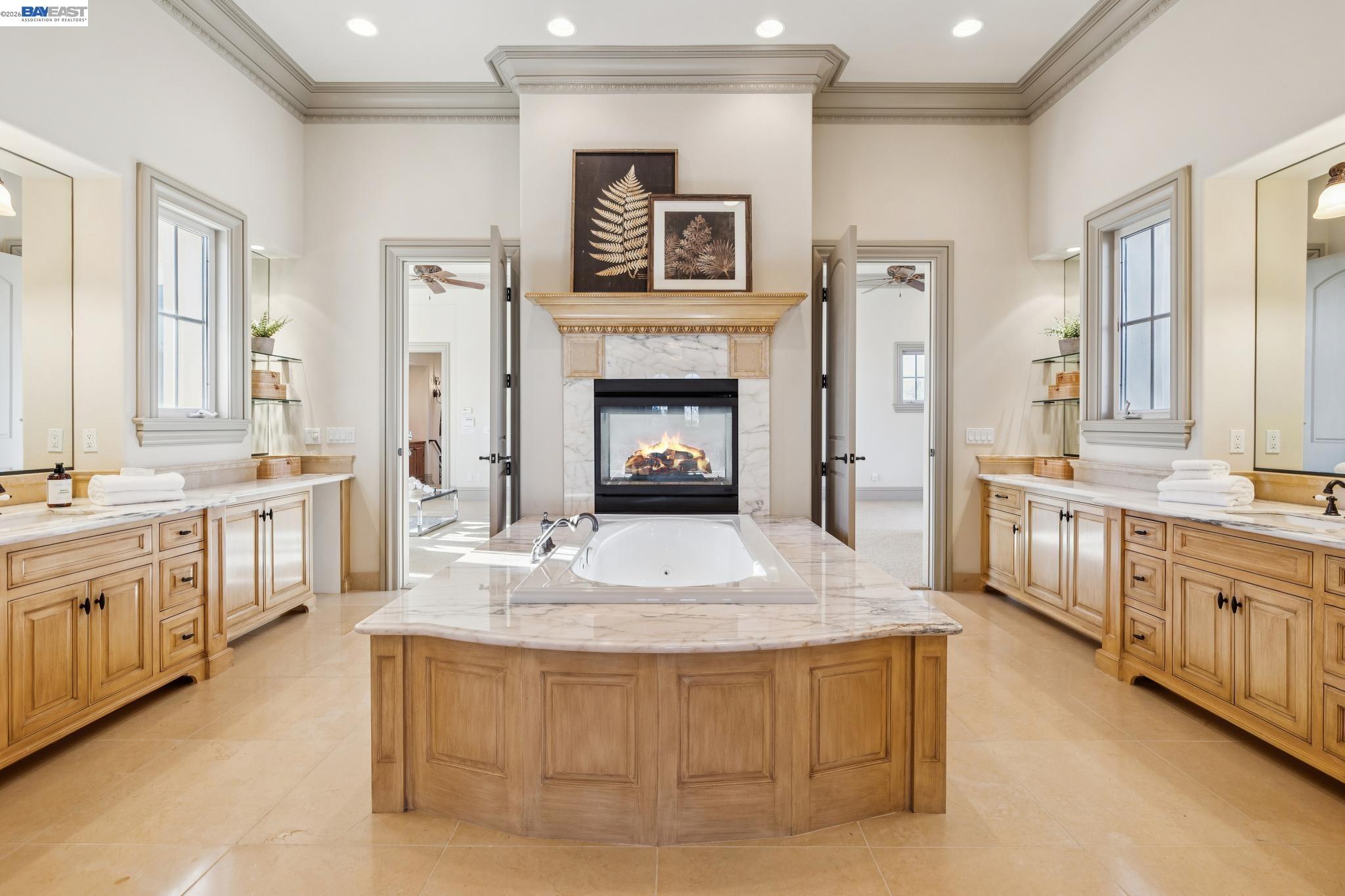 1398 Piemonte Drive Pleasanton, CA 94566 - Photo 34 of 60 a large white kitchen with granite countertop a large fireplace