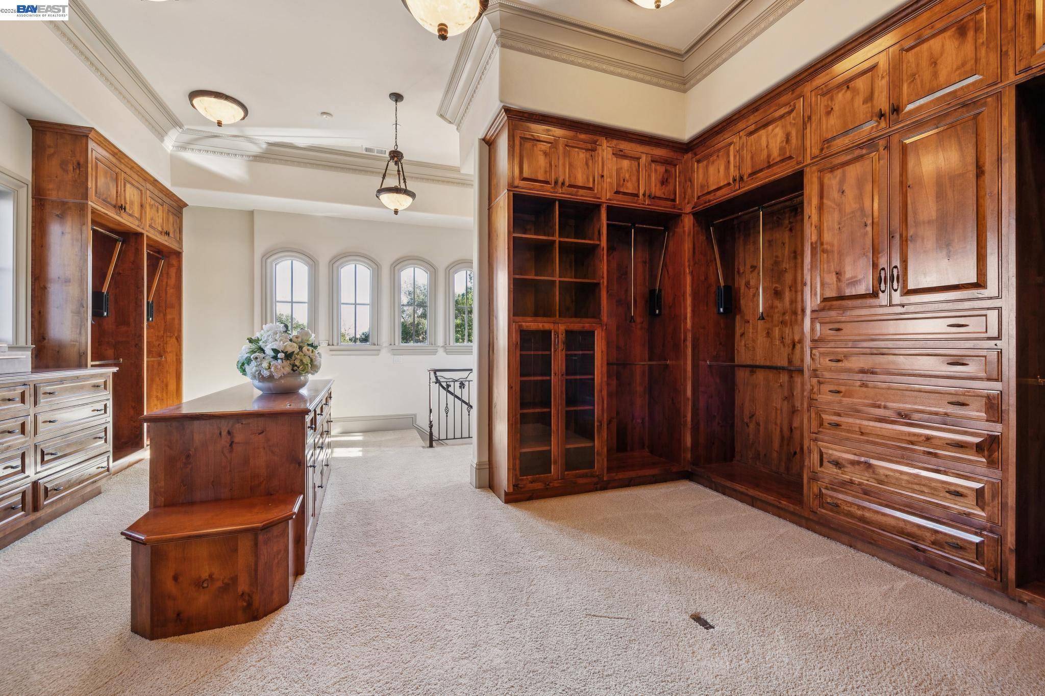 1398 Piemonte Drive Pleasanton, CA 94566 - Photo 35 of 60 a view of a hallway with a couch and chandelier