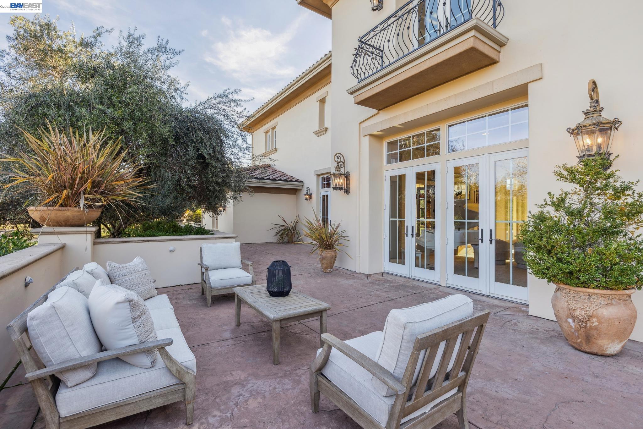 1398 Piemonte Drive Pleasanton, CA 94566 - Photo 4 of 60 a view of a patio with a table and chairs