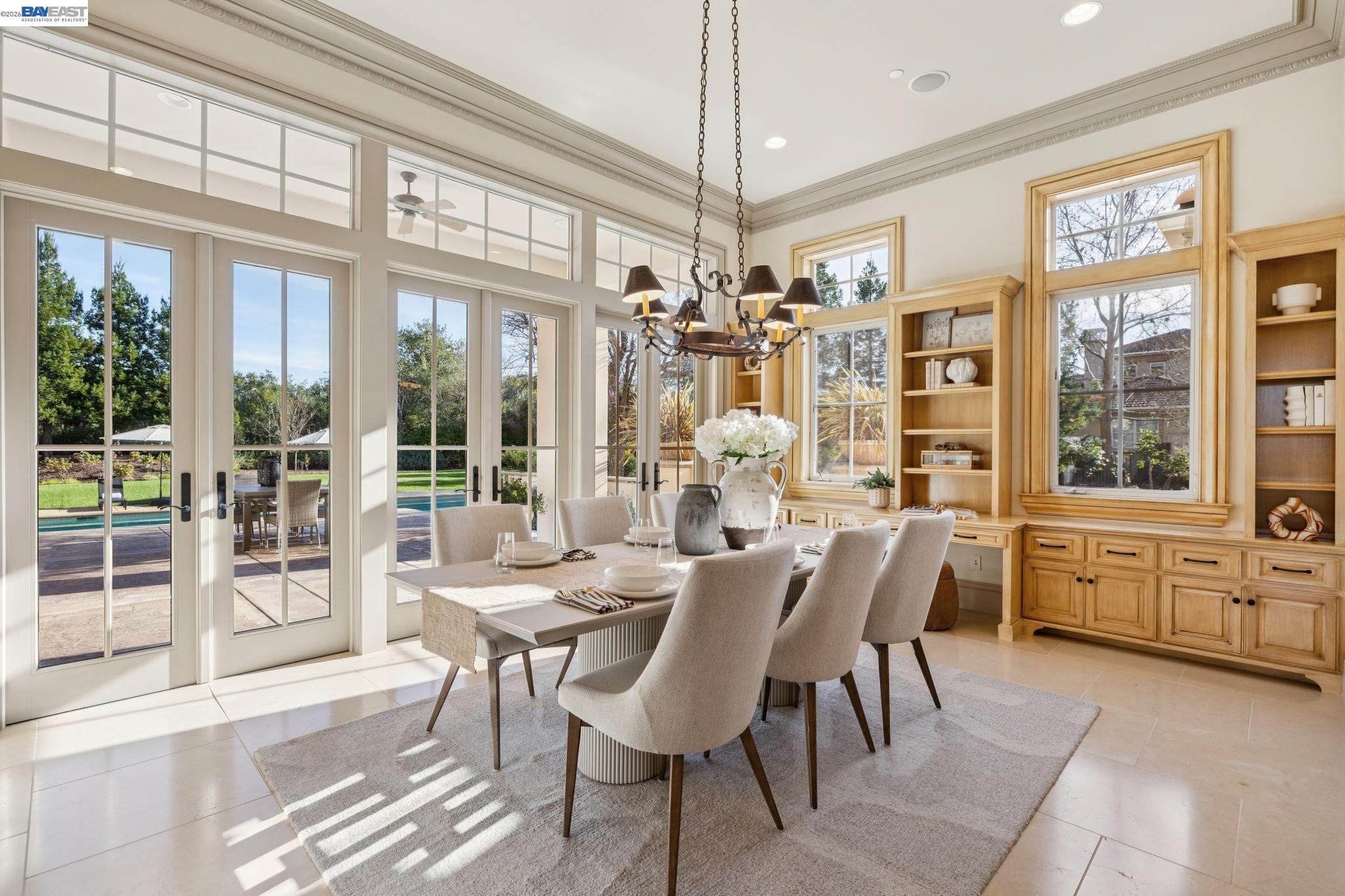 1398 Piemonte Drive Pleasanton, CA 94566 - Photo 45 of 60 a view of a dining room with furniture large windows and wooden floor