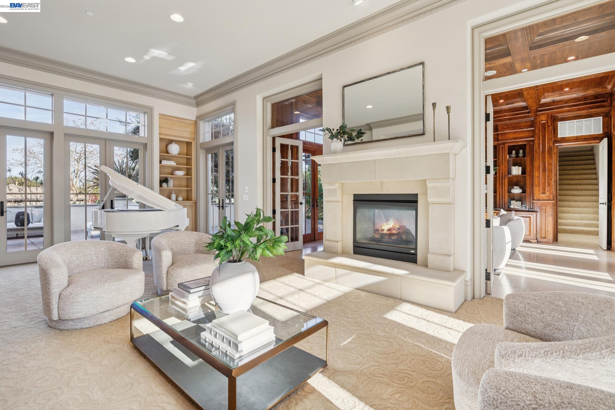 1398 Piemonte Drive Pleasanton, CA 94566 - Photo 8 of 60 a living room with furniture and a fireplace