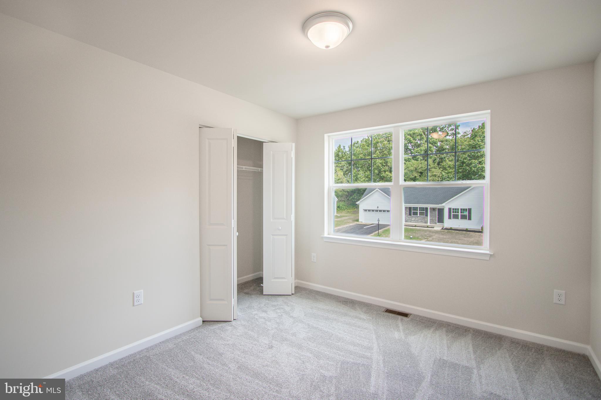 282 Valley View Circle, Unit 141 York, PA 17408 - Photo 23 of 43 an empty room with windows
