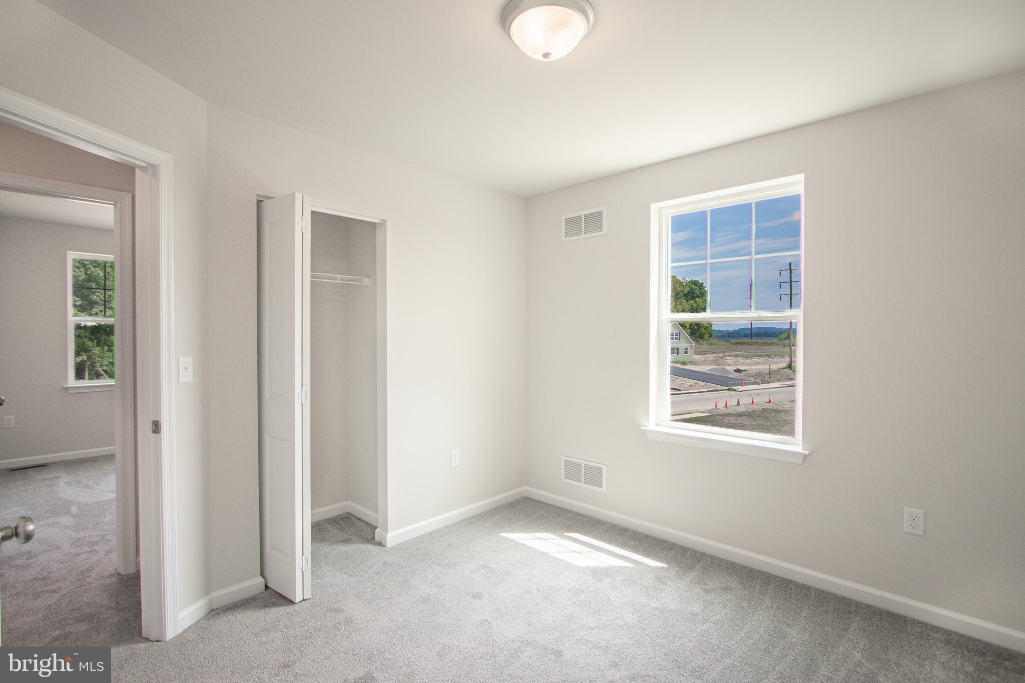 282 Valley View Circle, Unit 141 York, PA 17408 - Photo 28 of 43 an empty room with windows