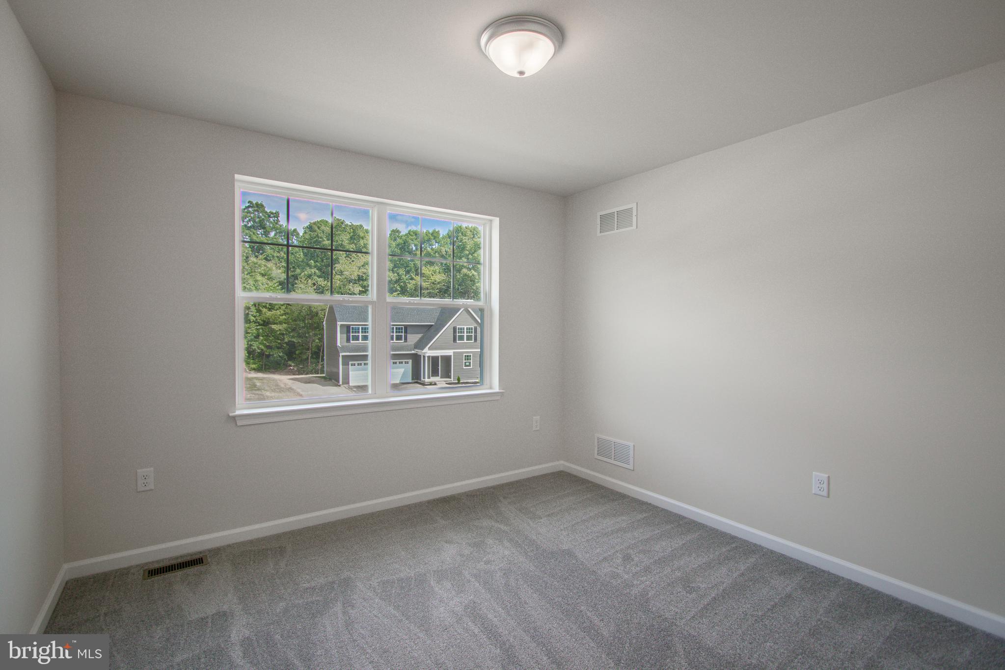 282 Valley View Circle, Unit 141 York, PA 17408 - Photo 29 of 43 an empty room with a window