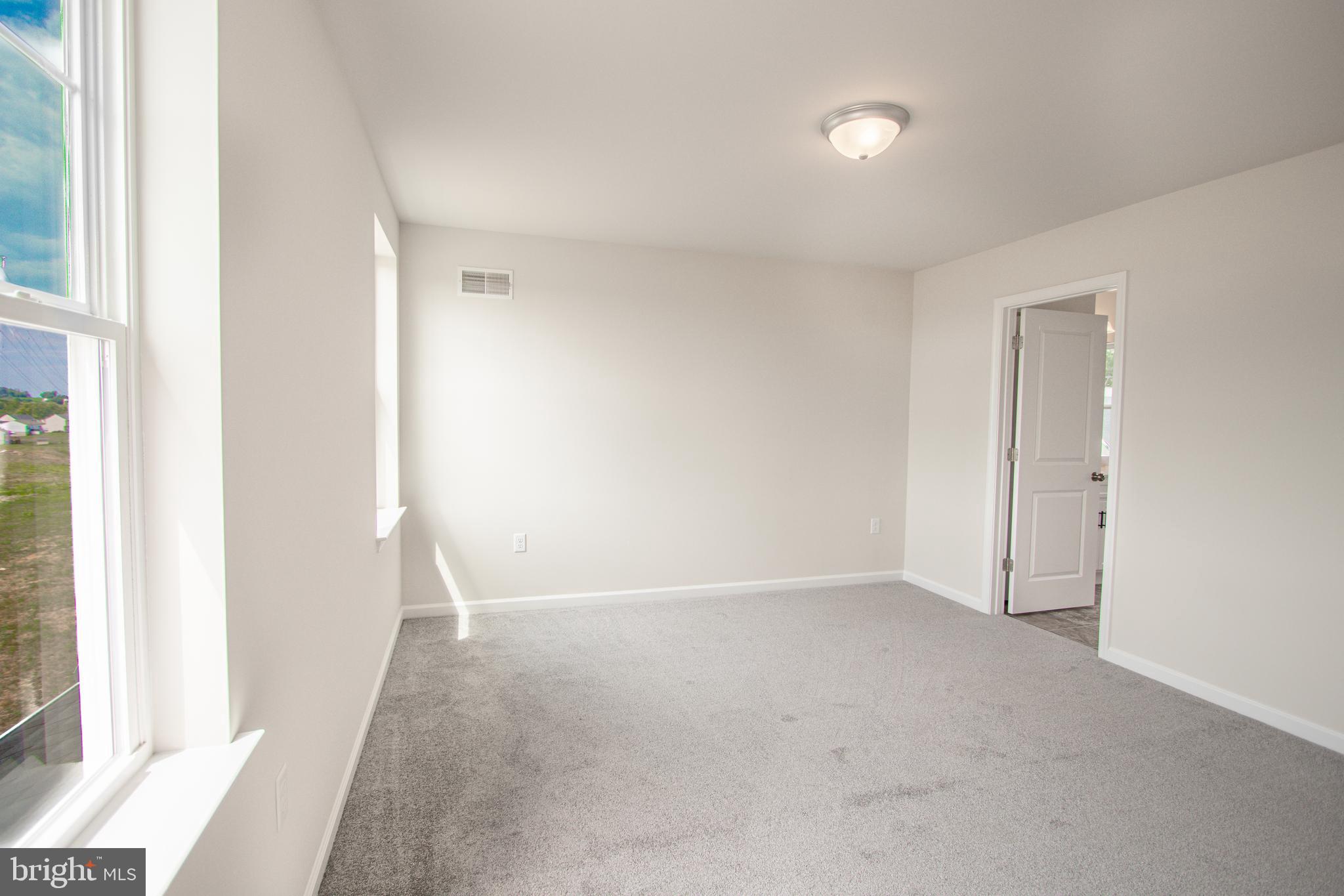 282 Valley View Circle, Unit 141 York, PA 17408 - Photo 36 of 43 an empty room with an entryway