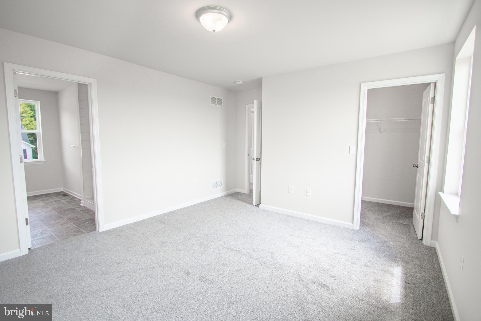 282 Valley View Circle, Unit 141 York, PA 17408 - Photo 37 of 43 an empty room with windows