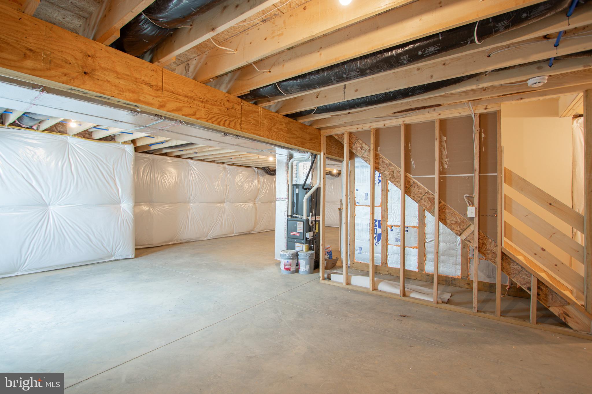 282 Valley View Circle, Unit 141 York, PA 17408 - Photo 41 of 43 a view of an empty room with stairs