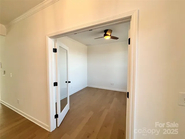 a view of a hallway with closet