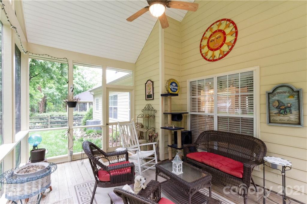 7401 Reedy Creek Road, Unit 24 Charlotte, NC 28215 - Photo 27 of 31 a living room with furniture and a window