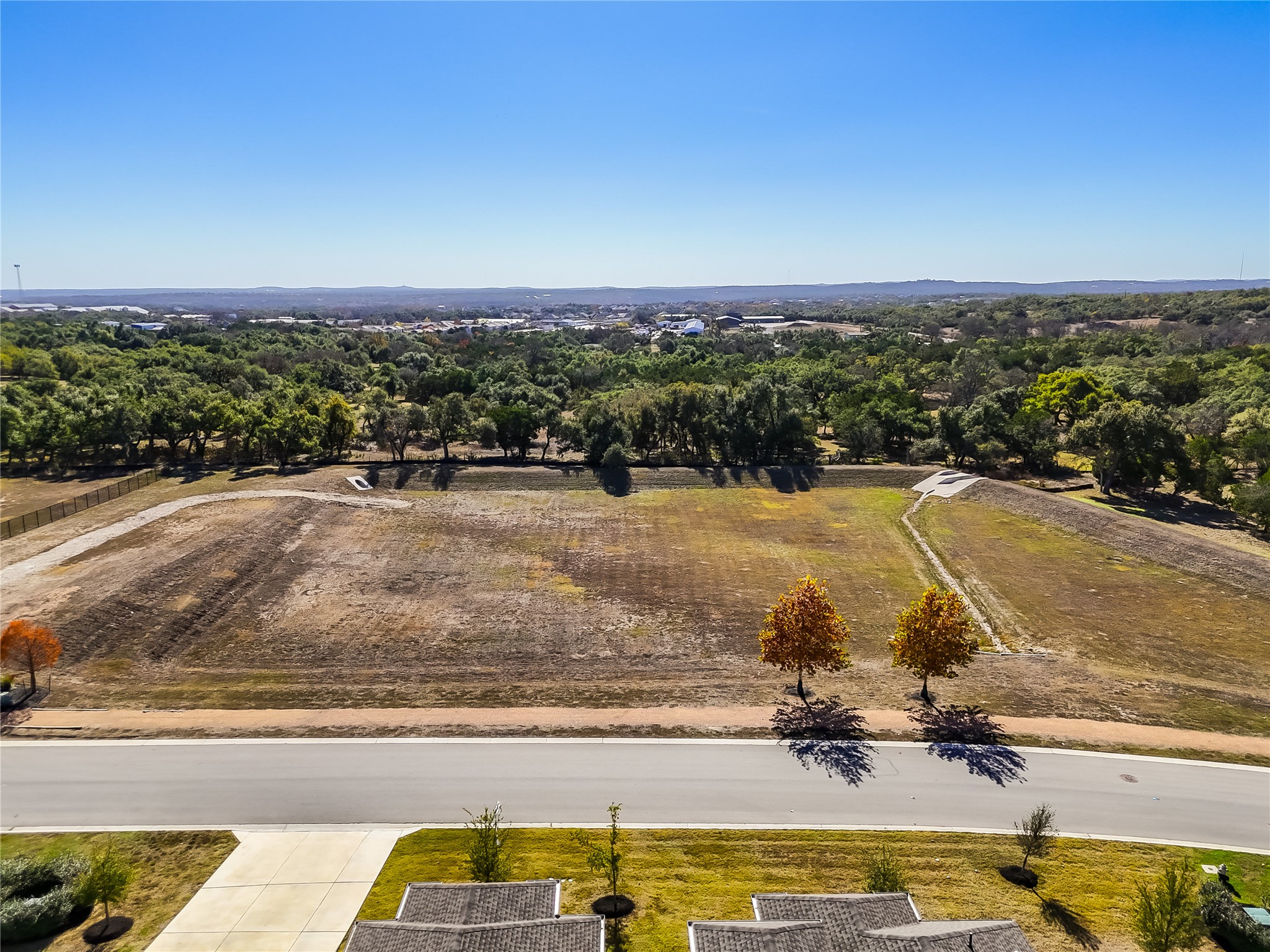 494 Prairie Clover Drive Dripping Springs, TX 78620 - Photo 36 of 39 Aerial view of property showing front facing view with greenspace (no homes across the street). Looking south