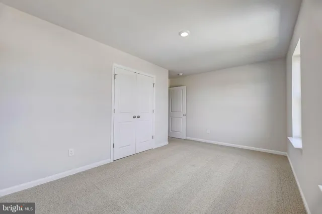 an empty room with a natural light