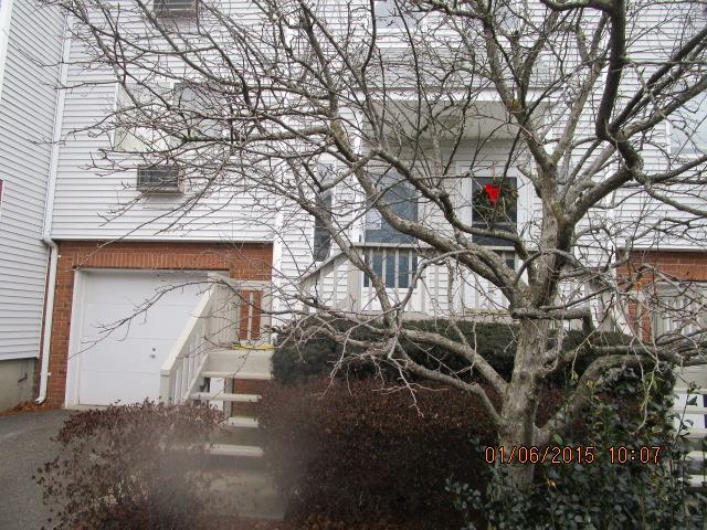 925 Oronoke Road, Unit 22C Waterbury, CT 06708 - Photo 1 of 1 a house with yard in front of it