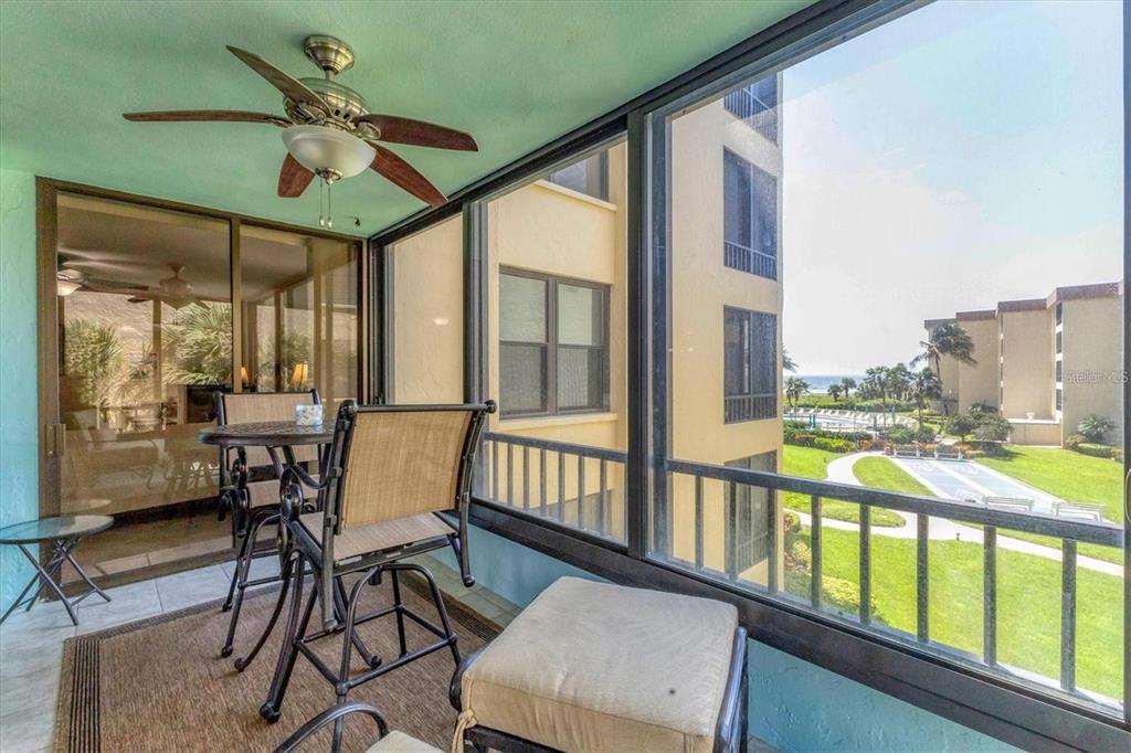 8776 Midnight Pass Road, Unit C307 Sarasota, FL 34242 - Photo 21 of 45 a view of a city from a dining room
