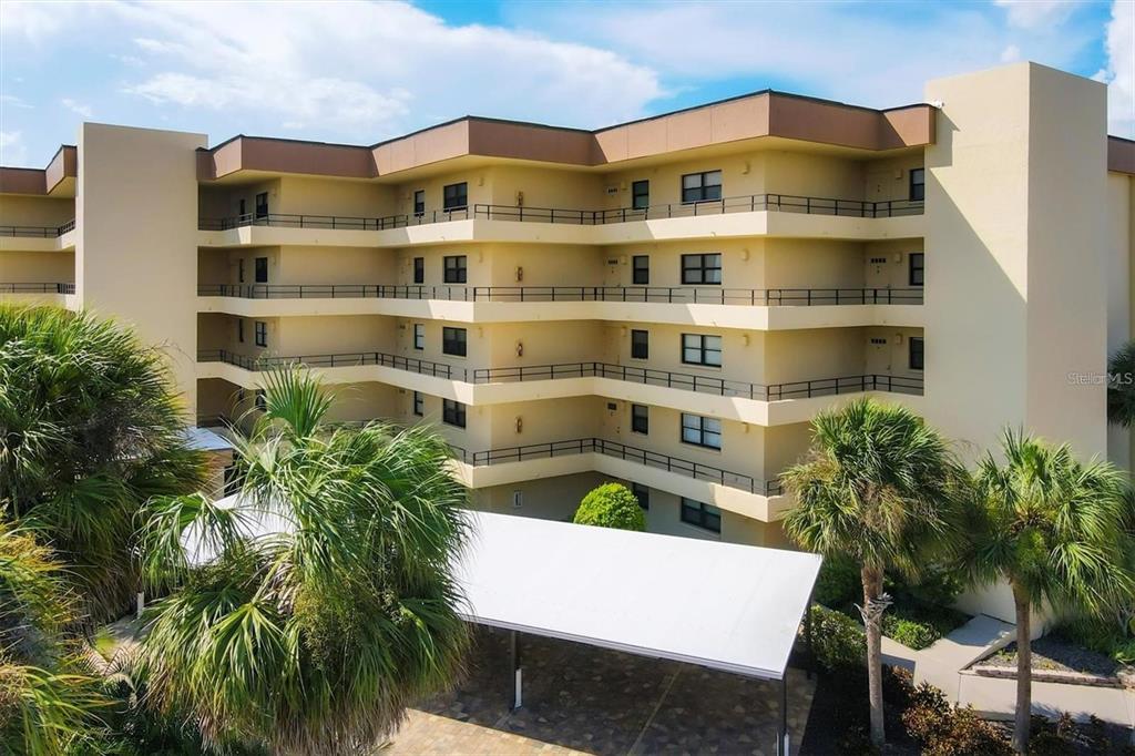 8776 Midnight Pass Road, Unit C307 Sarasota, FL 34242 - Photo 42 of 45 a front view of a building