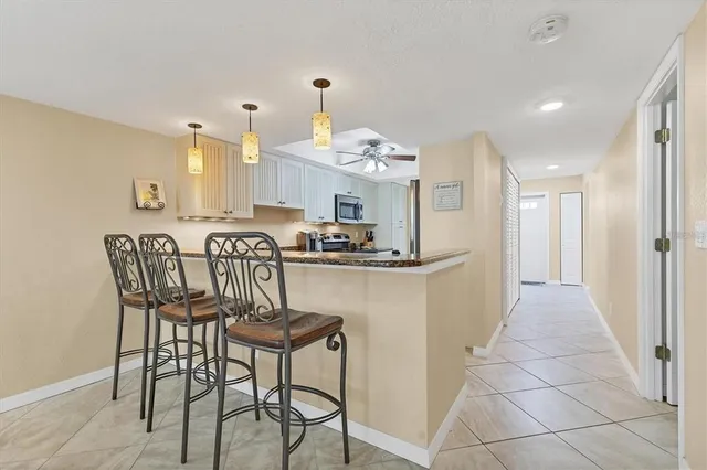 a view of a dining room kitchen and a window