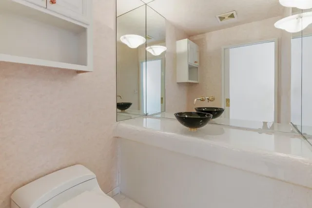 a view of entryway with a front door and wooden floor