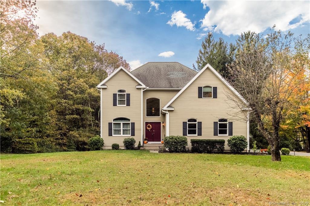 301 Teller Road Monroe, CT 06468 - Photo 1 of 1 a front view of a house with a yard