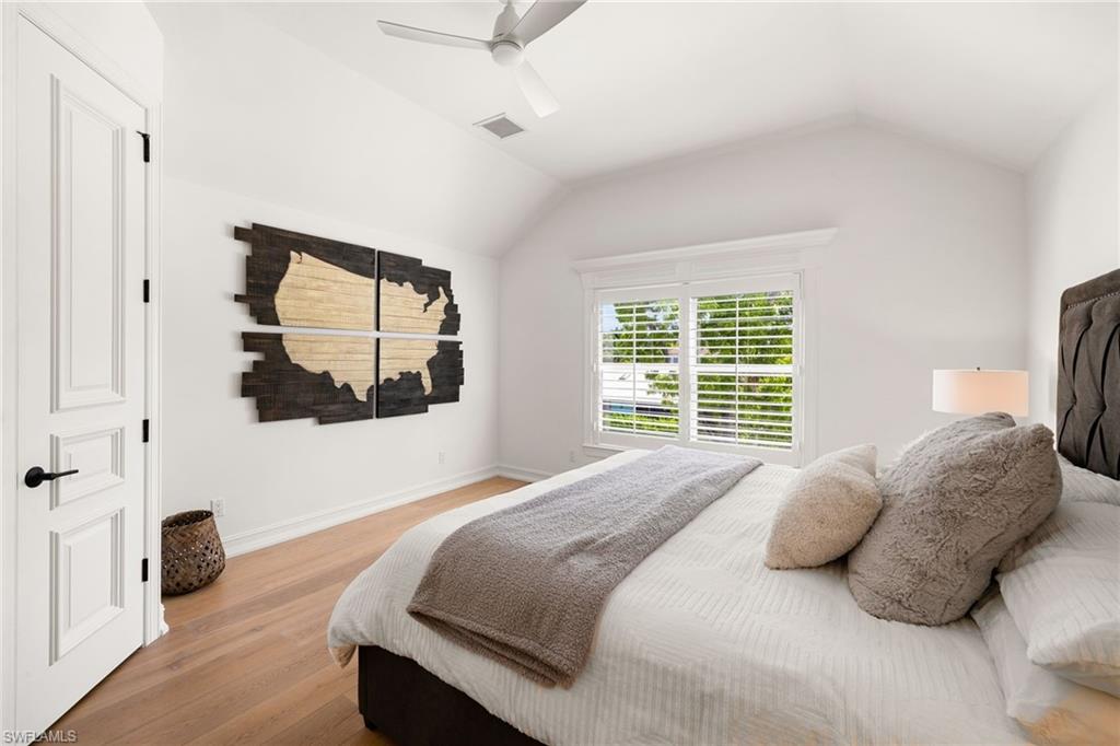 950 8th Street South Naples, FL 34102 - Photo 17 of 21 a bedroom with a bed and a window