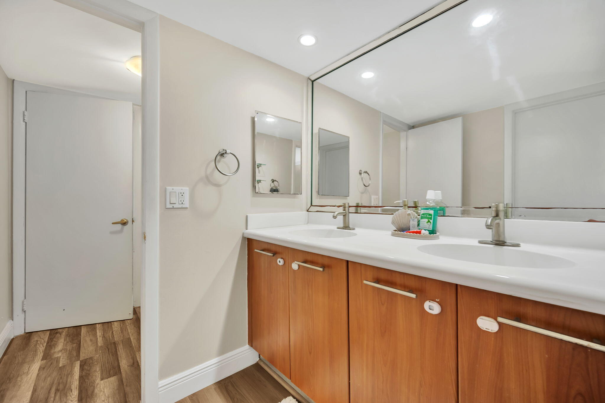 777 Northeast 62nd Street, Unit C512 Miami, FL 33138 - Photo 19 of 40 a bathroom with a double vanity sink mirror and