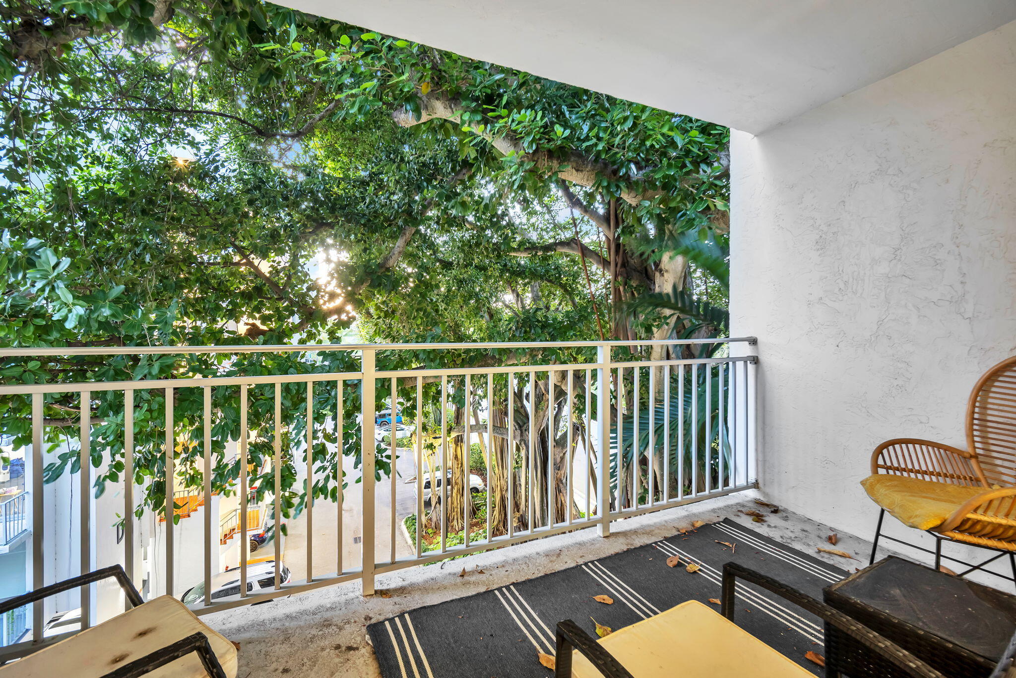 777 Northeast 62nd Street, Unit C512 Miami, FL 33138 - Photo 23 of 40 a view of a balcony with chair and wooden floor