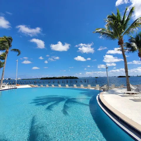 a view of a swimming pool and outdoor space