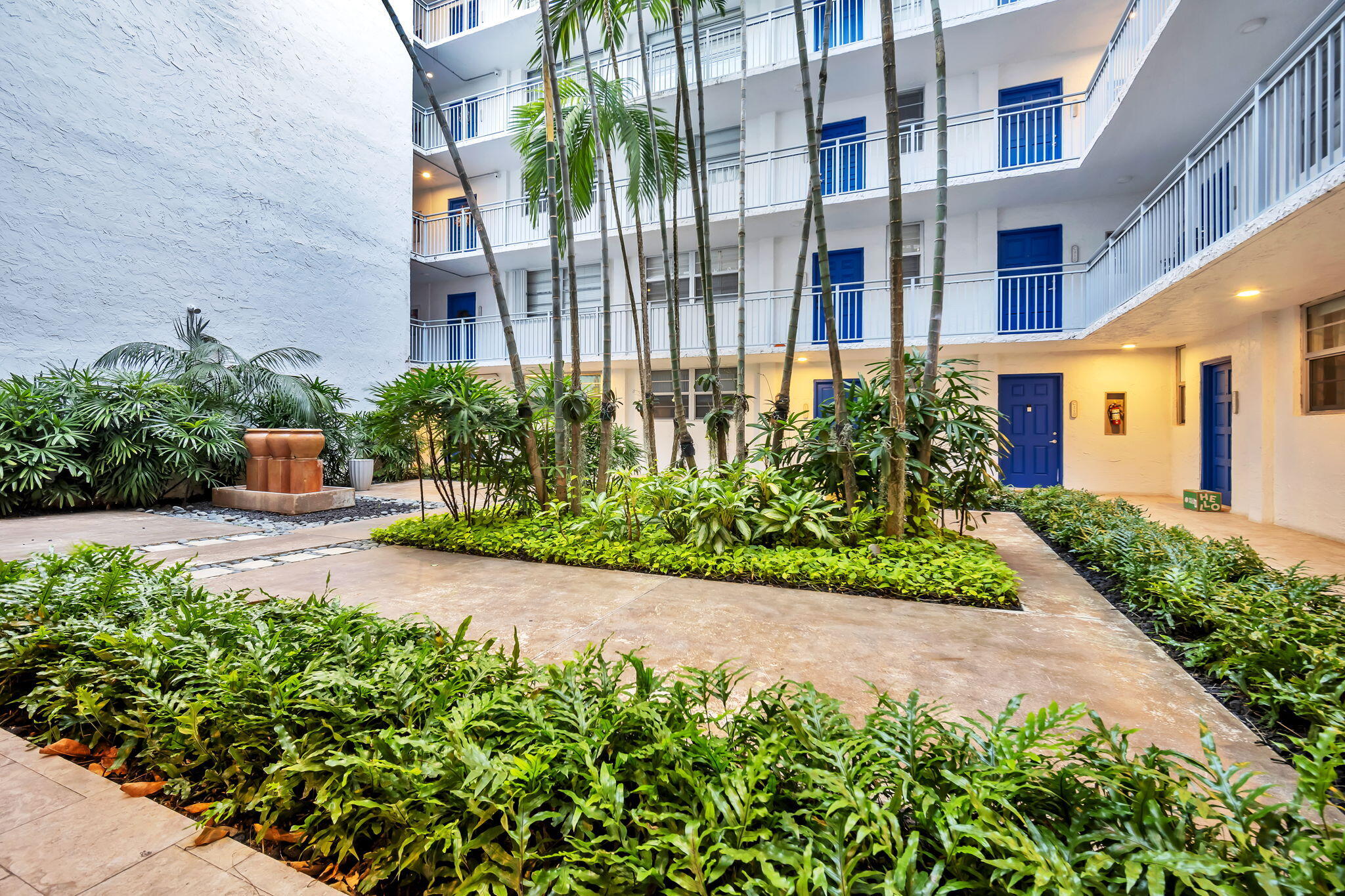 777 Northeast 62nd Street, Unit C512 Miami, FL 33138 - Photo 4 of 40 a view of a garden with pathway