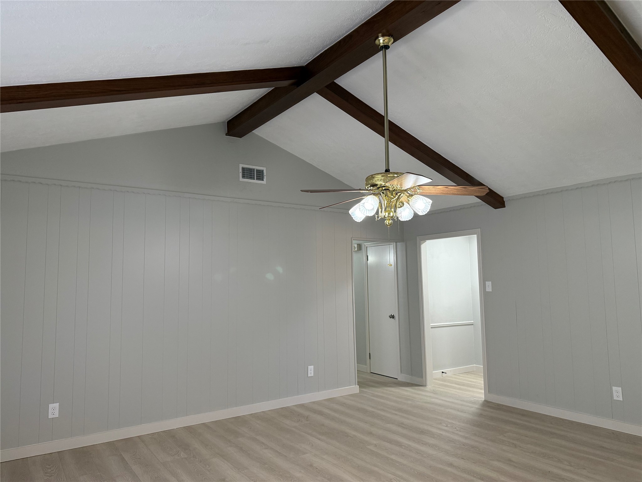 5622 Killough Street Houston, TX 77086 - Photo 5 of 21 a view of an empty room with wooden floor