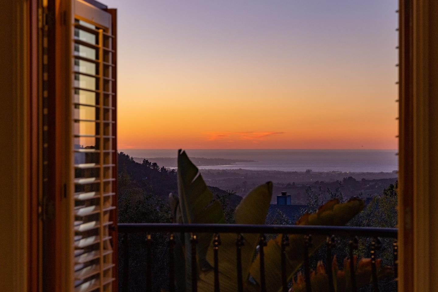 a view of a balcony with an outdoor space