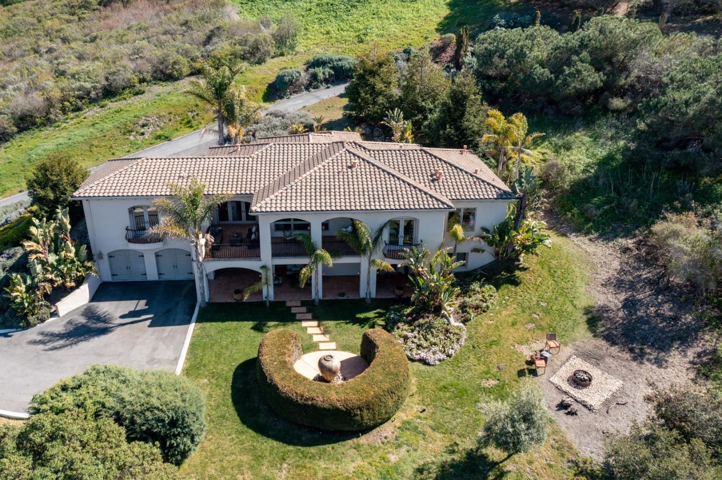 11550 Spur Road Monterey, CA 93940 - Photo 16 of 60 an aerial view of a house with swimming pool and garden