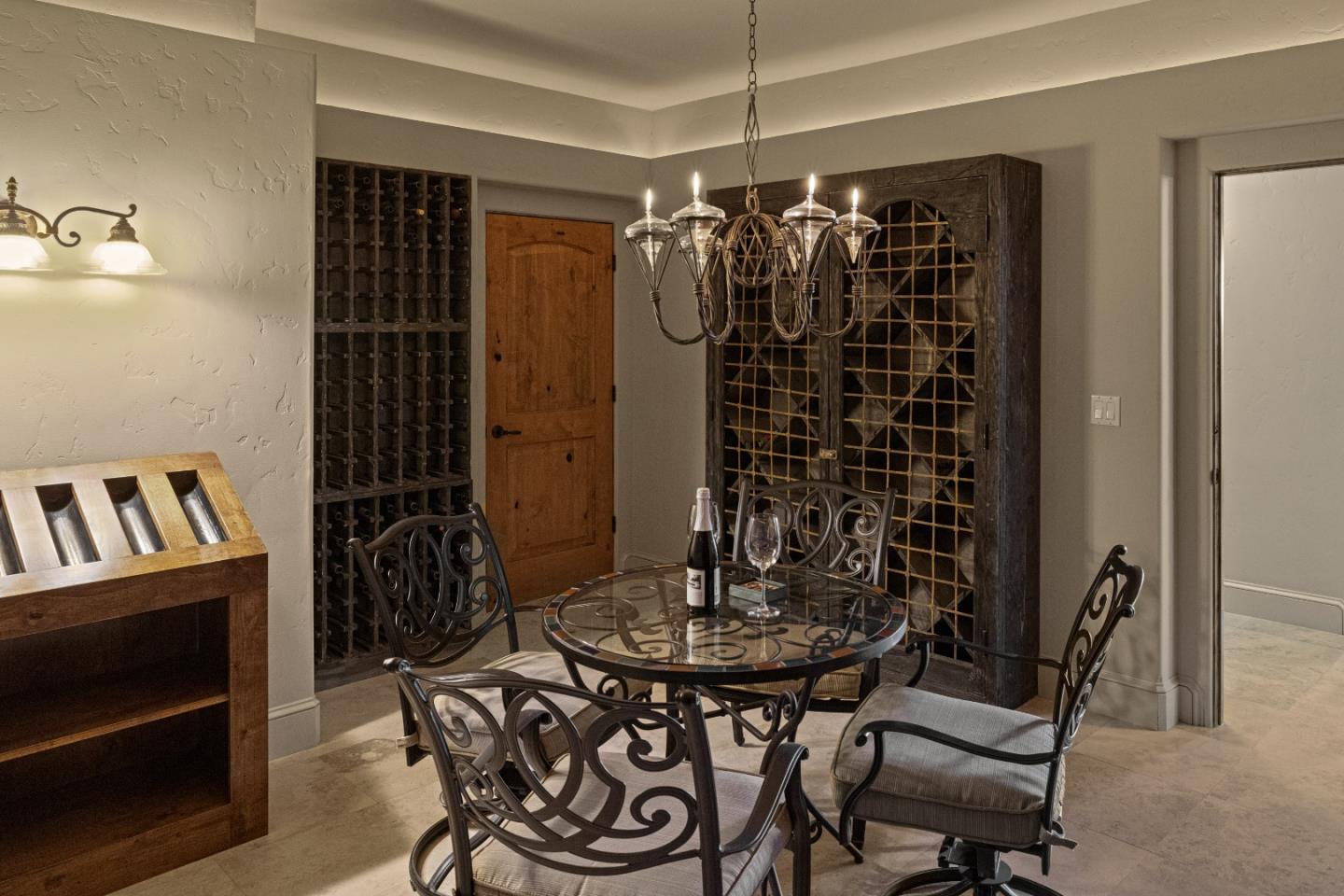 11550 Spur Road Monterey, CA 93940 - Photo 26 of 60 a view of a dining room with furniture and chandelier