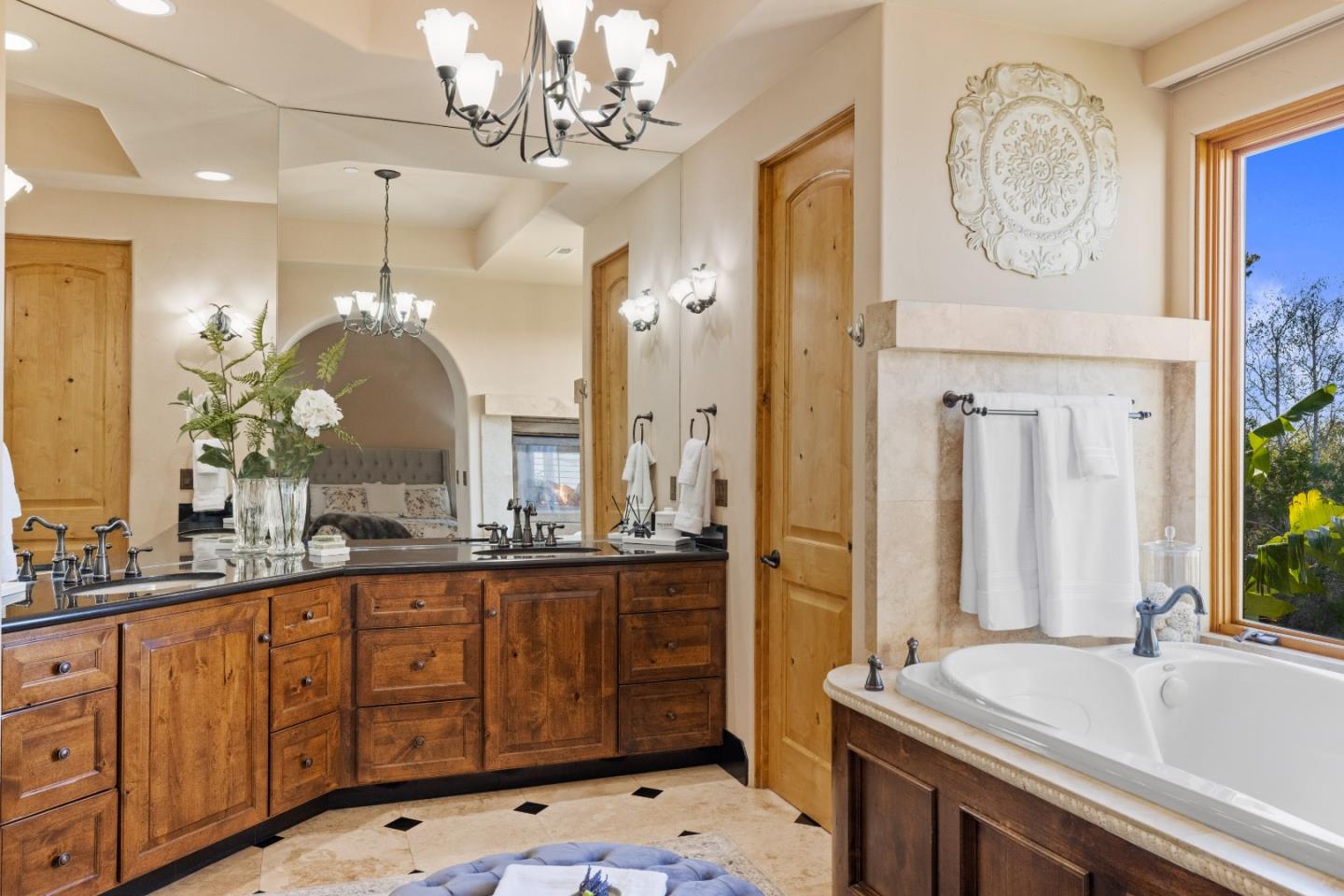 11550 Spur Road Monterey, CA 93940 - Photo 31 of 60 a large bathroom with a sink a large mirror and a shower