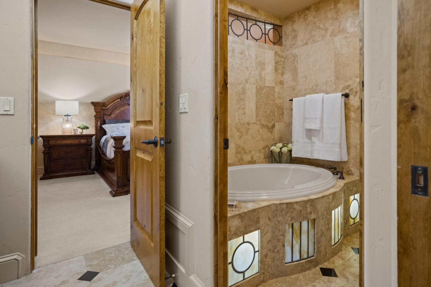 11550 Spur Road Monterey, CA 93940 - Photo 39 of 60 a bathroom with a granite countertop shower and a sink