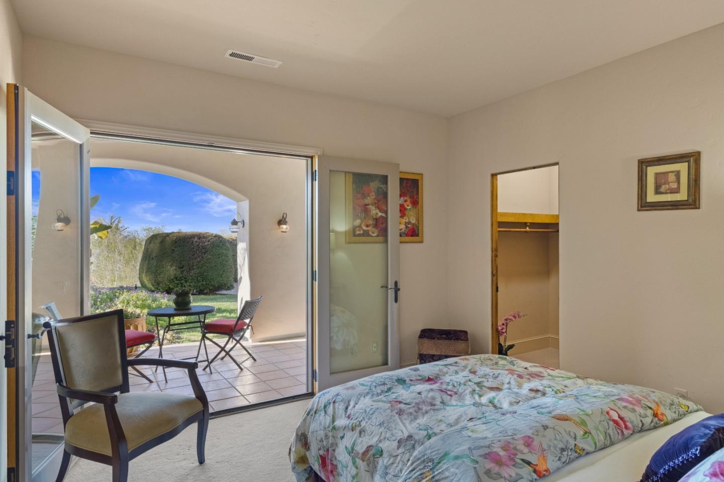 11550 Spur Road Monterey, CA 93940 - Photo 42 of 60 a bedroom with a bed and large windows