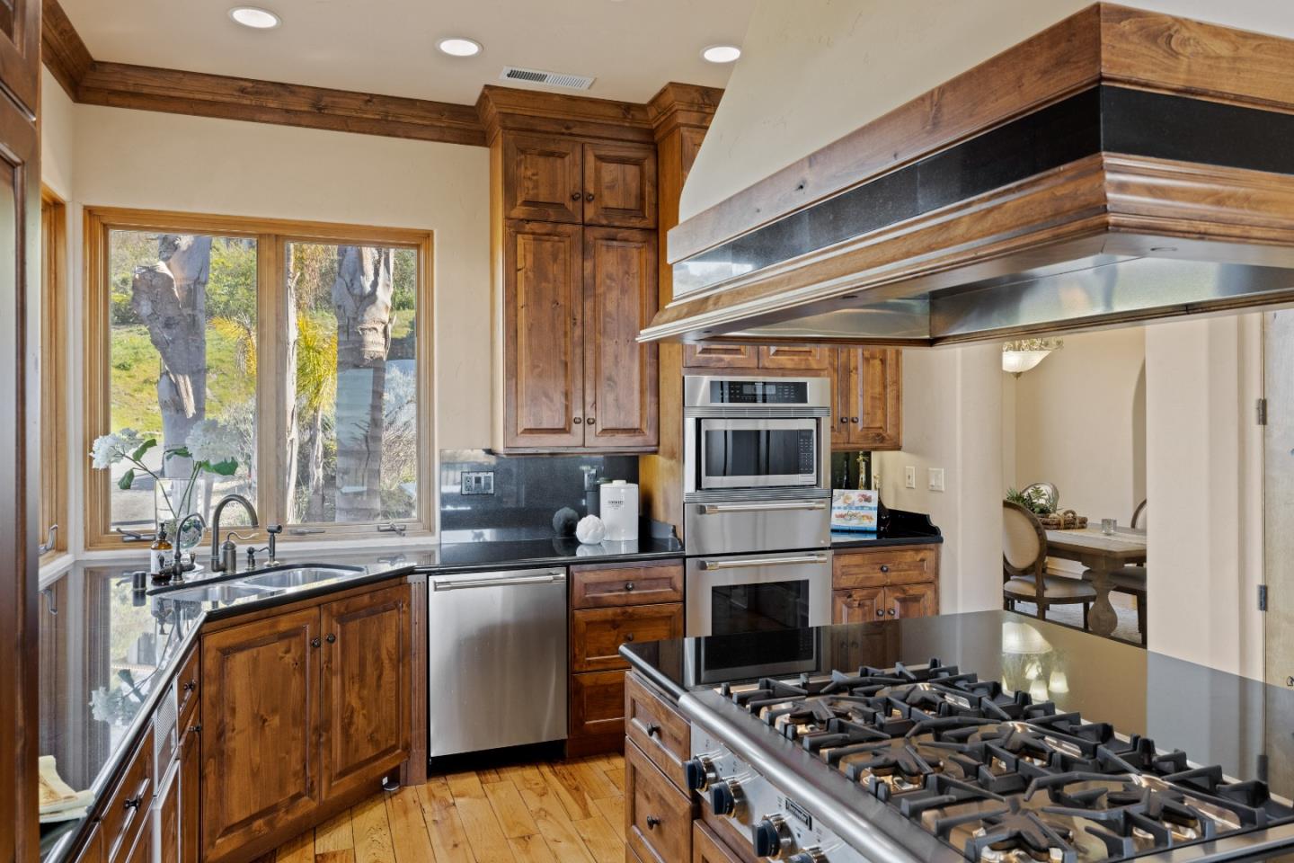 11550 Spur Road Monterey, CA 93940 - Photo 52 of 60 a kitchen with stainless steel appliances a sink a stove and a refrigerator