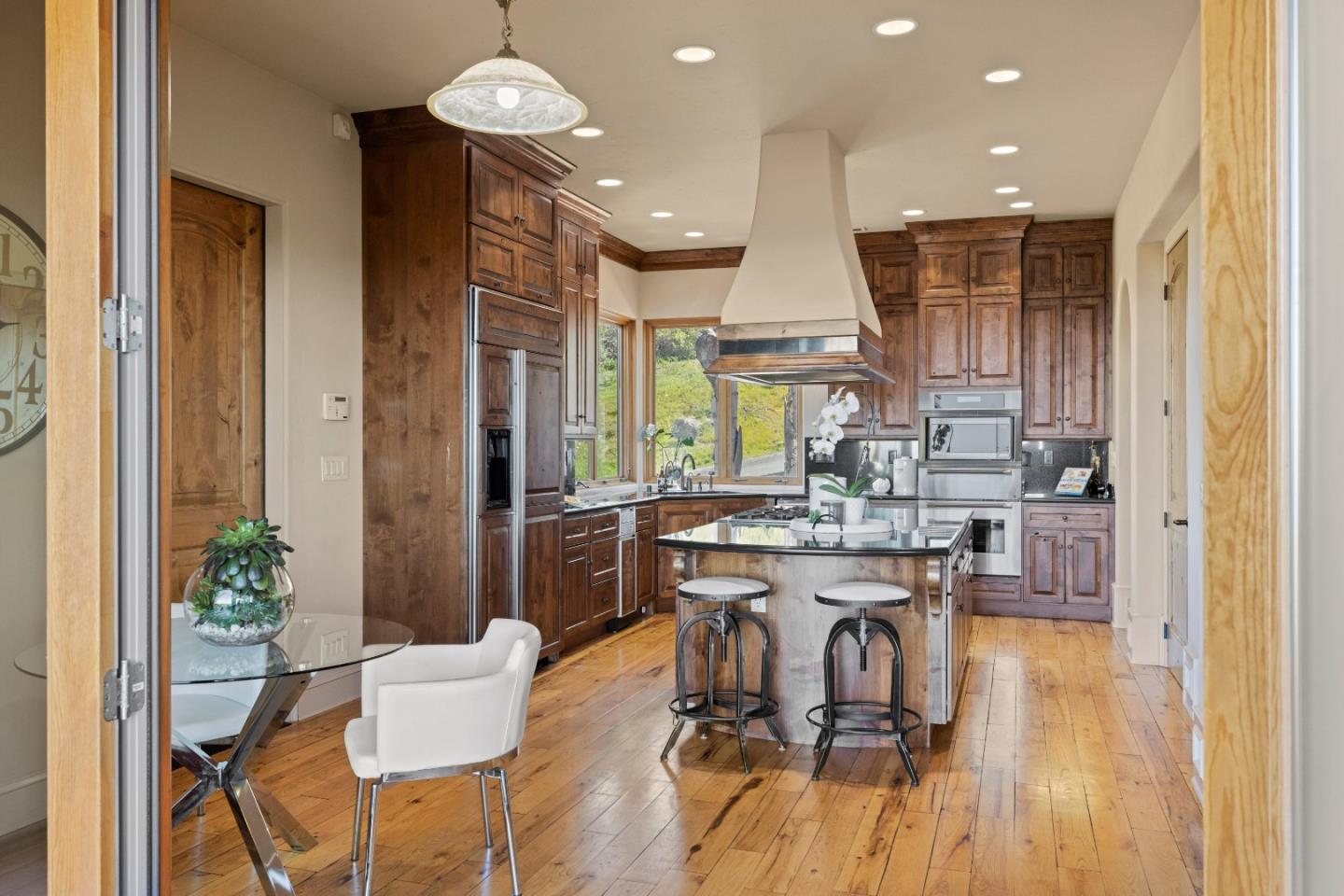11550 Spur Road Monterey, CA 93940 - Photo 53 of 60 a view of a dining room with furniture window and wooden floor