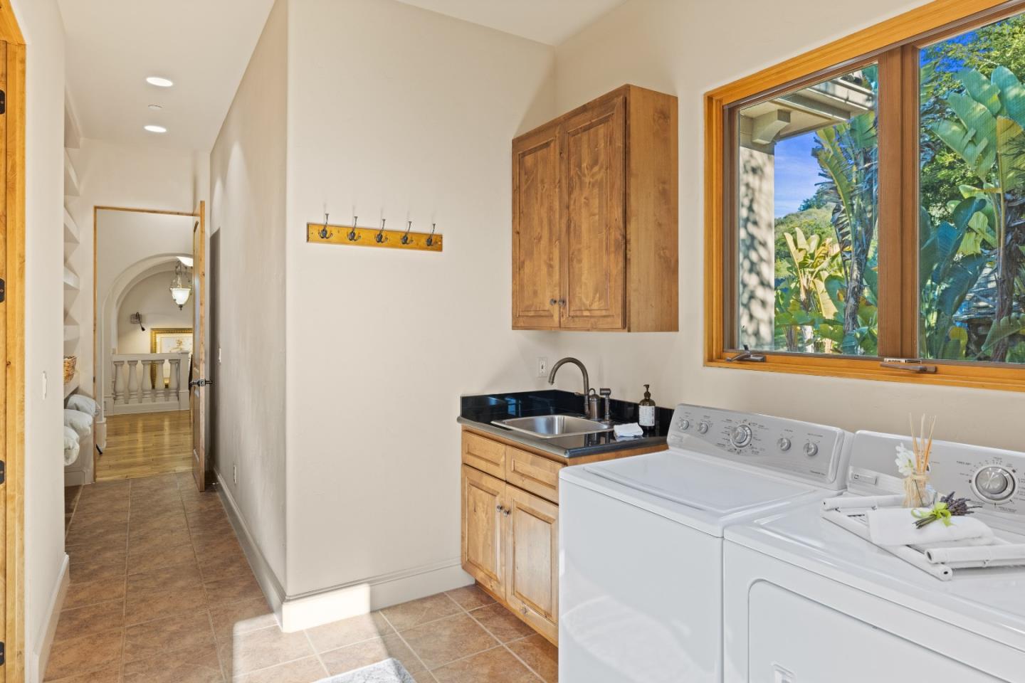 11550 Spur Road Monterey, CA 93940 - Photo 56 of 60 a kitchen with a sink cabinets and a window