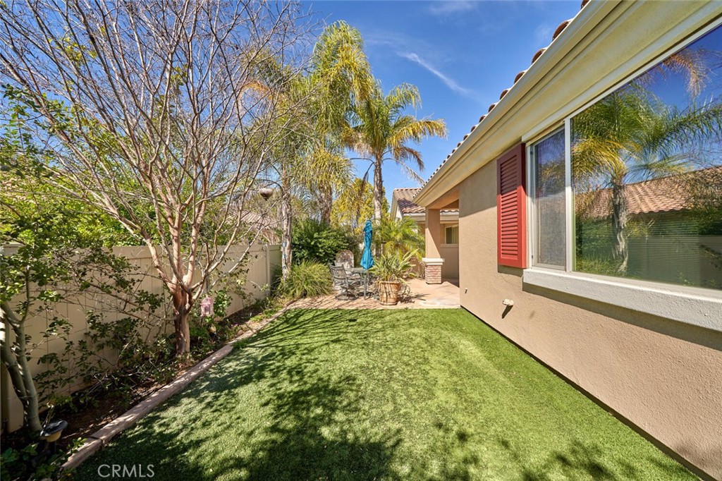1143 Saguara Road Beaumont, CA 92223 - Photo 25 of 66 a view of backyard with swimming pool and outdoor seating