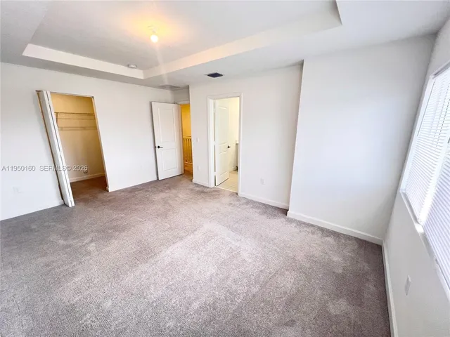 an empty room with a natural light